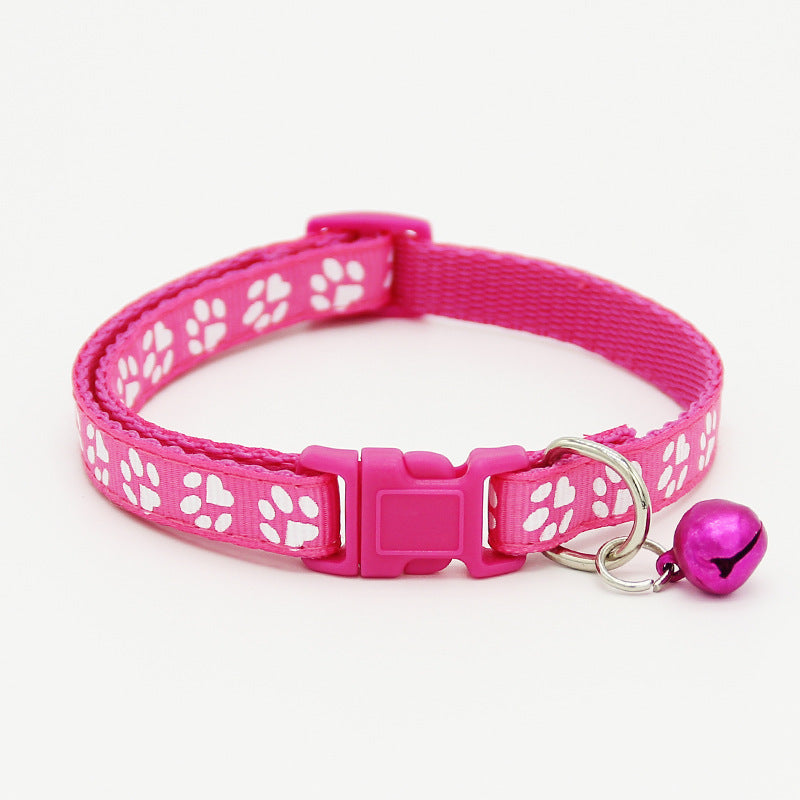 The pet cat wears a bell collar — product detail