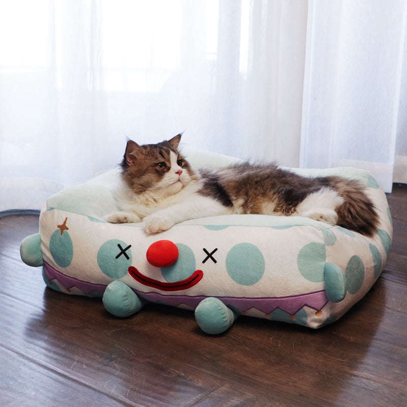 Clown Pet Sleeps In A Cozy Pet Bed — product detail